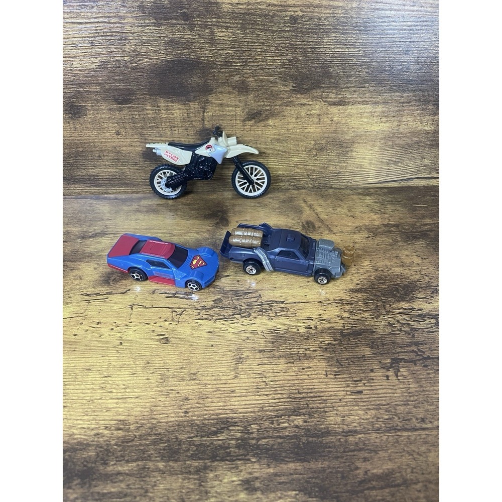 Lot of 2 cars and a motorcycle